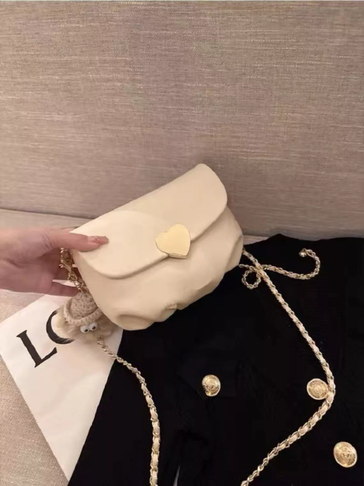 Heart buckle chain crossbody bag product image | Orleve