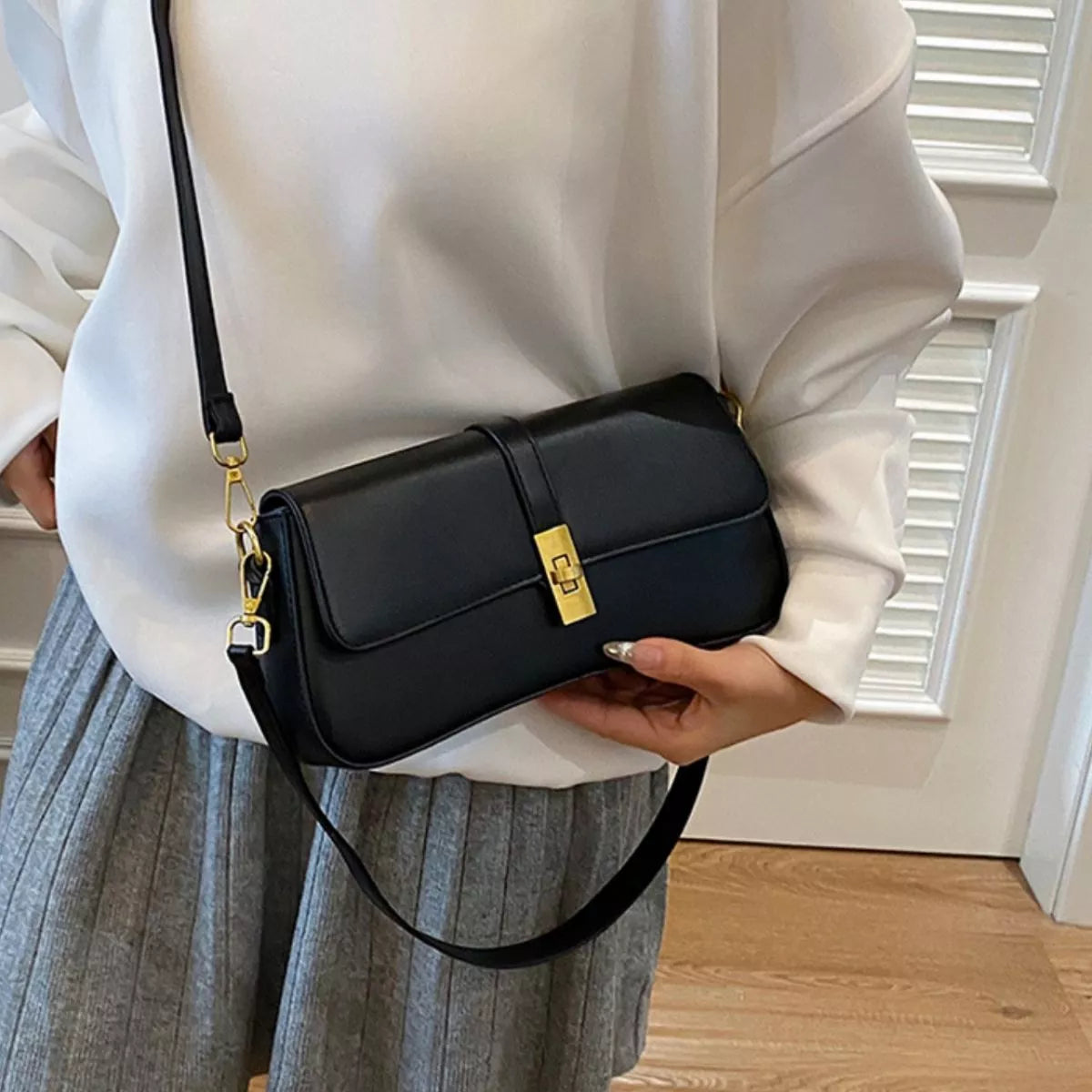 Rectangular golden buckle crossbody bag front view | Orleve