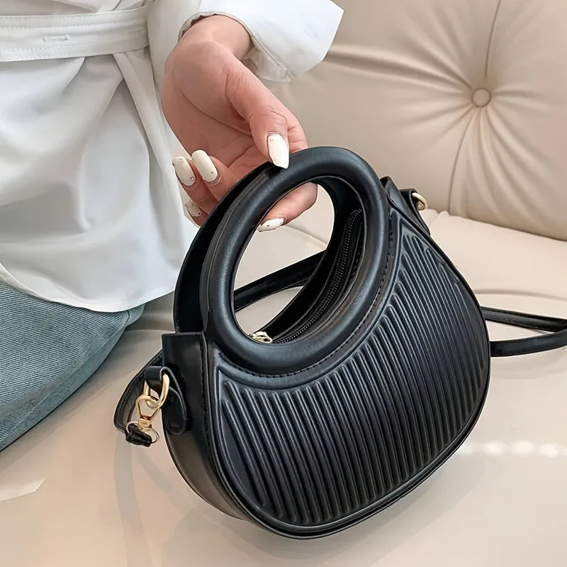 Sequin crescent shoulder bag side view | ORLEVE