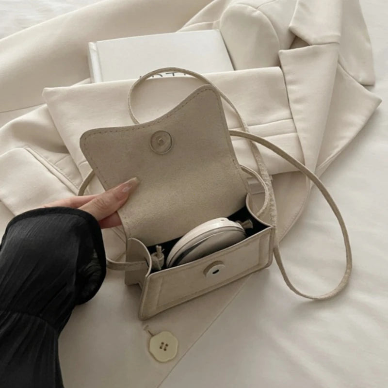 Structured box crossbody bag styling | ORLEVE
