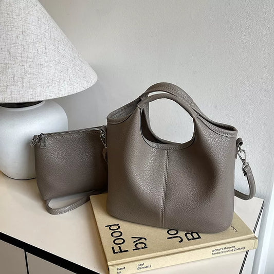 Textured leather crossbody bag with matching pouch side view | Orleve