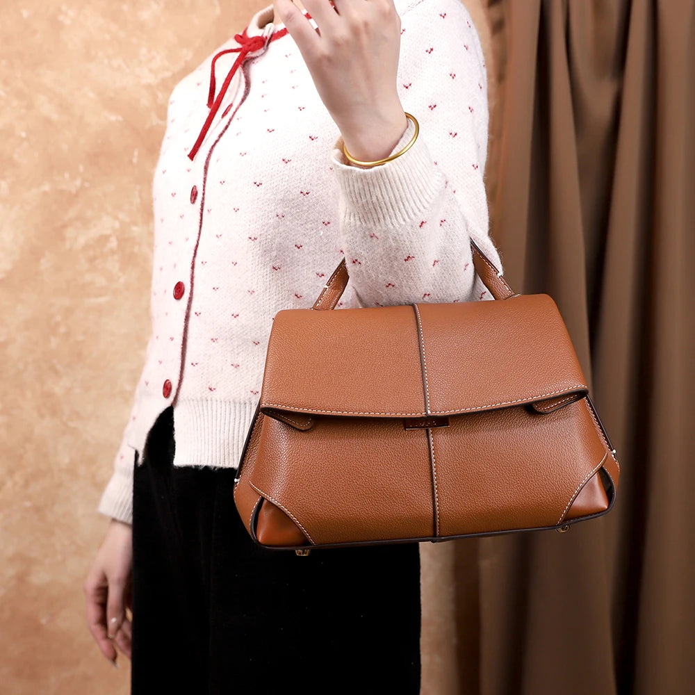 Vintage leather satchel handbag silhouette | ORLEVE